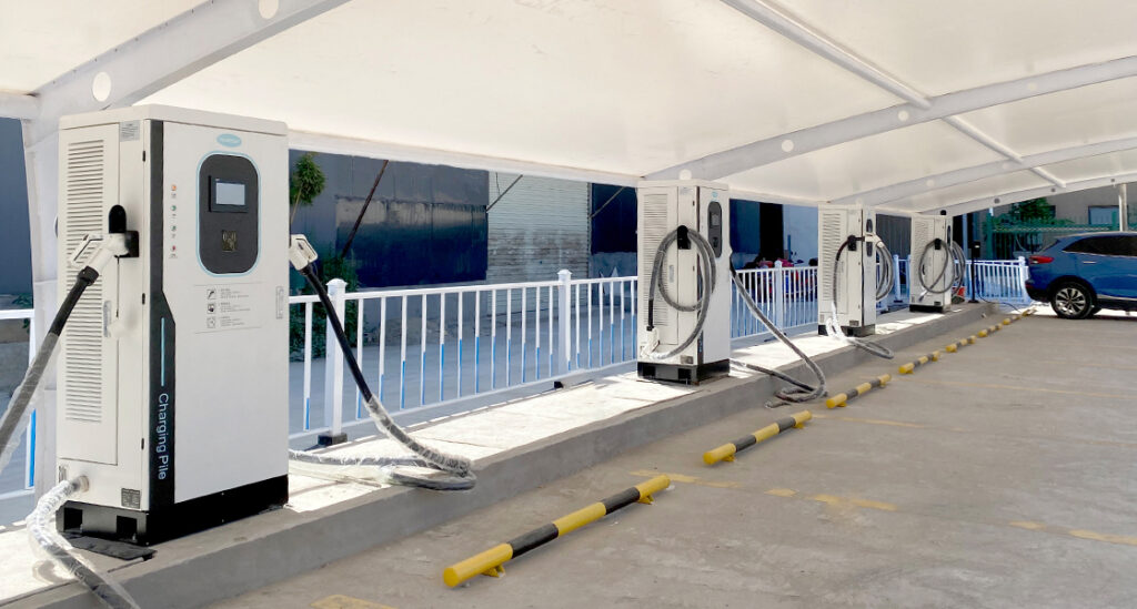 Commercial EV charging station with multiple DC fast chargers in operation